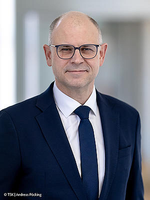 Staatssekretär Norman Müller